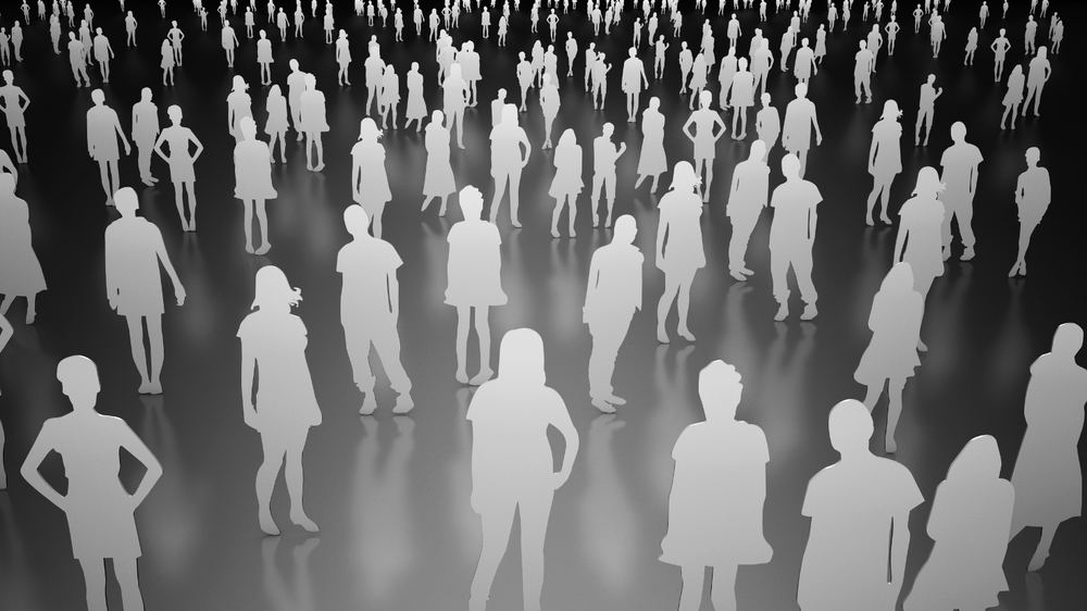 Viele Menschen stehen in einem Raum verteilt